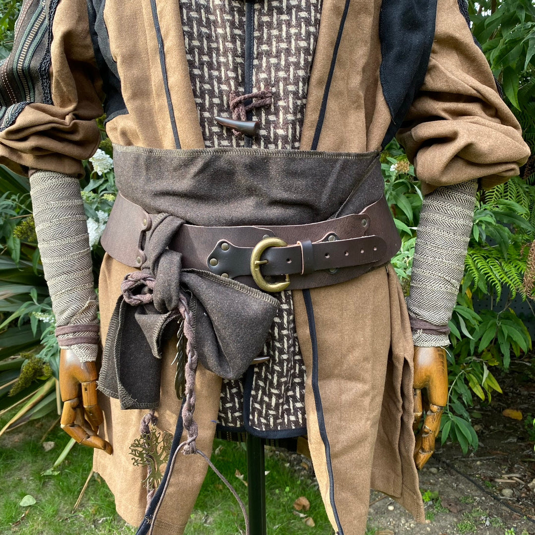LARP outfit with herringbone wool arm wraps and decorative leather belt.