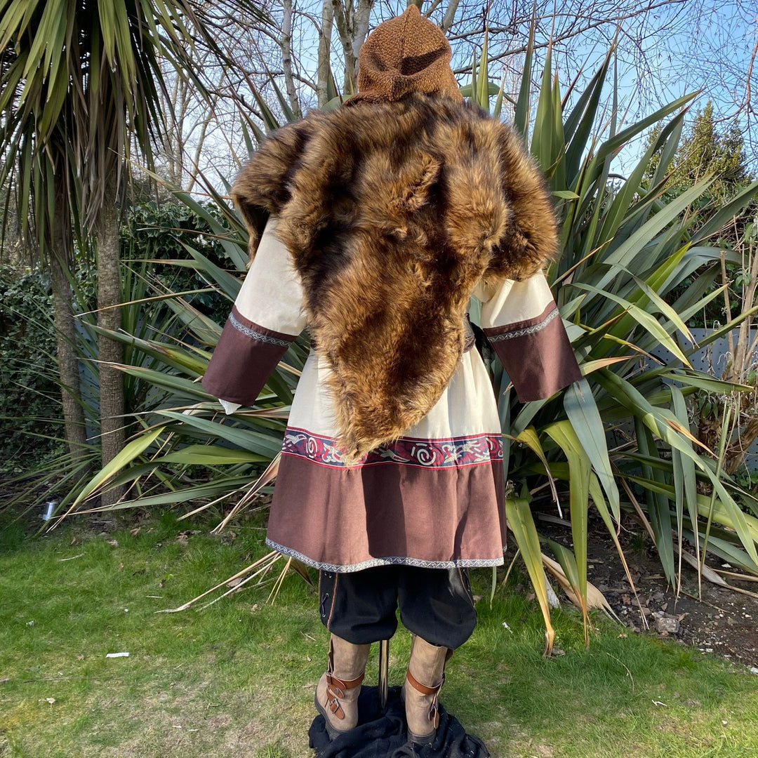 Back view of a LARP outfit showing tunic details and faux fur mantle.