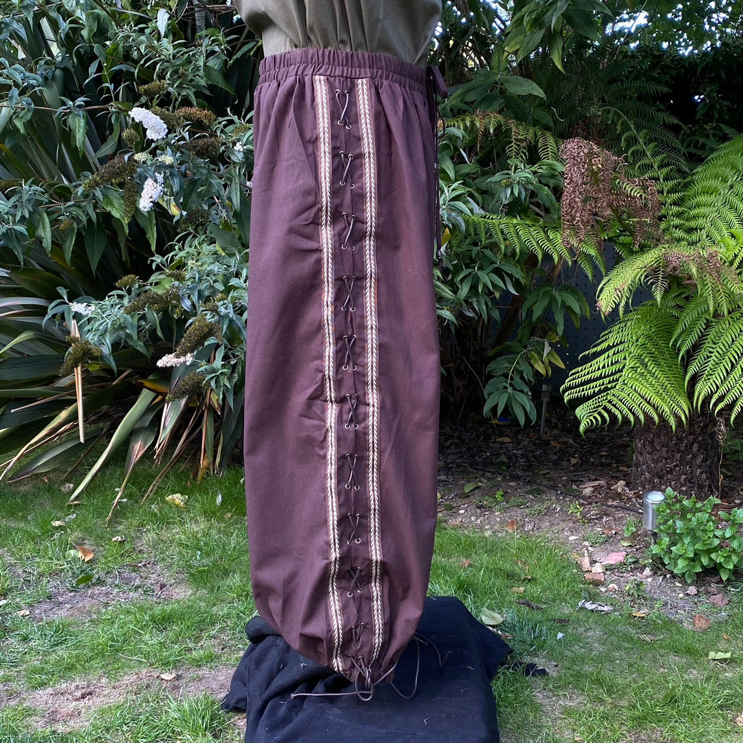 Brown medieval trousers with side lace detail.