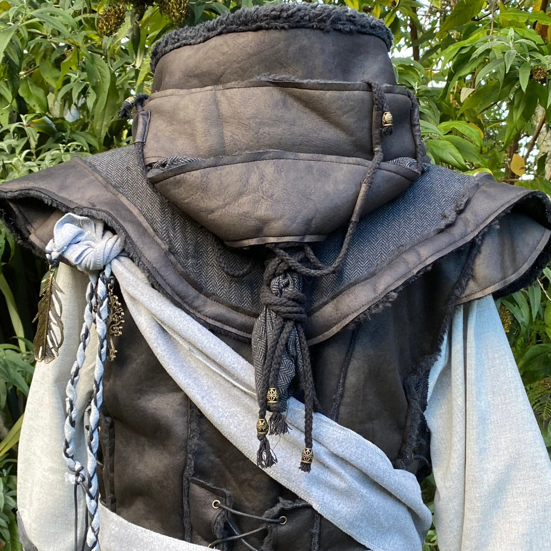 Back view of layered LARP hood with ornate braids and tassels, medieval style.