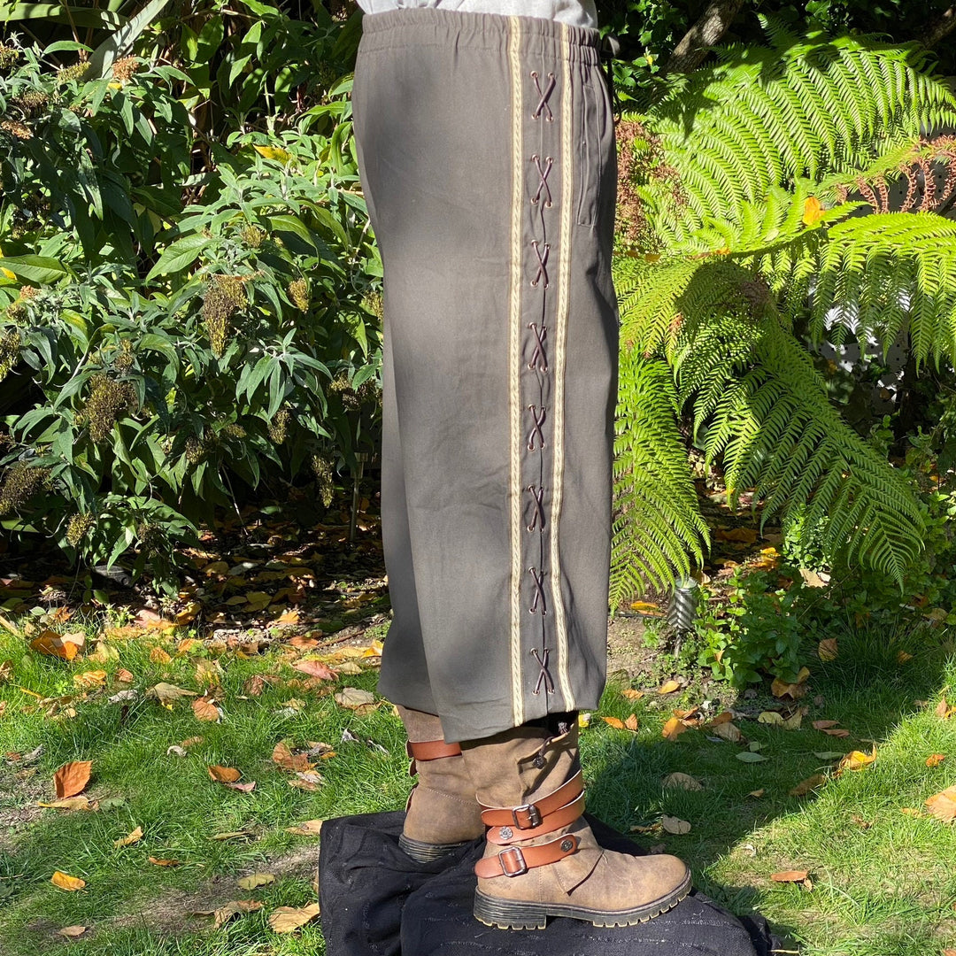 Side angle of green-grey pants with side lacing for LARP medieval outfit.