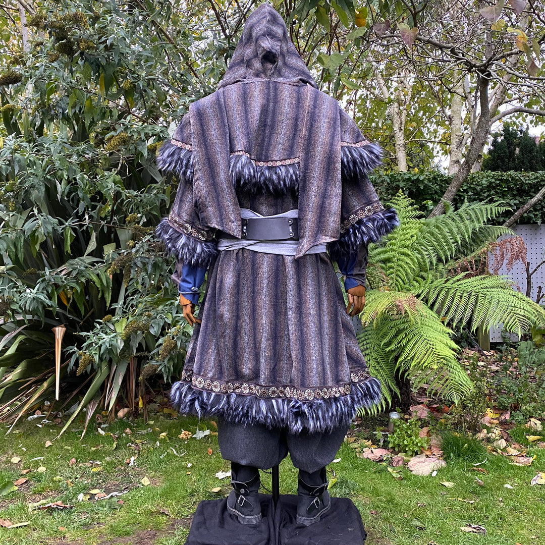 Medieval LARP outfit back view, featuring a blue and grey fur trim tunic, matching hood.