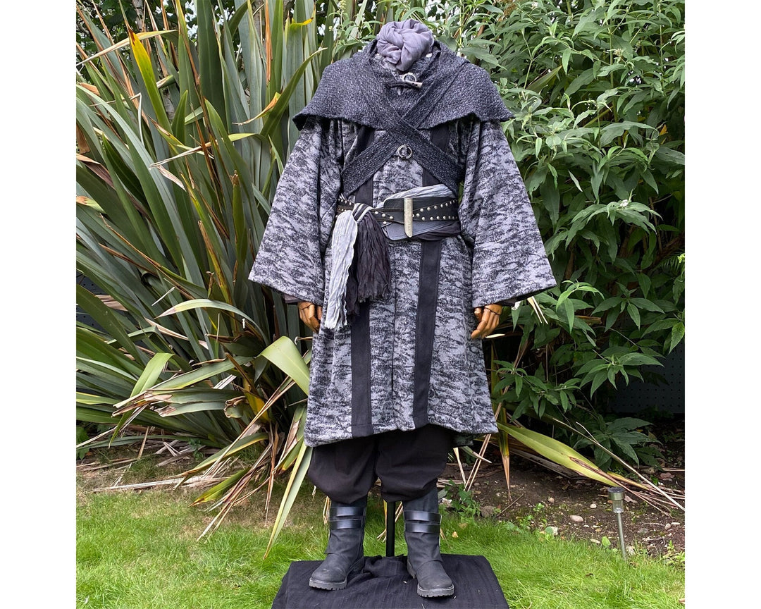 Medieval LARP costume front view, featuring grey and black hooded robe, and a grey woollen.