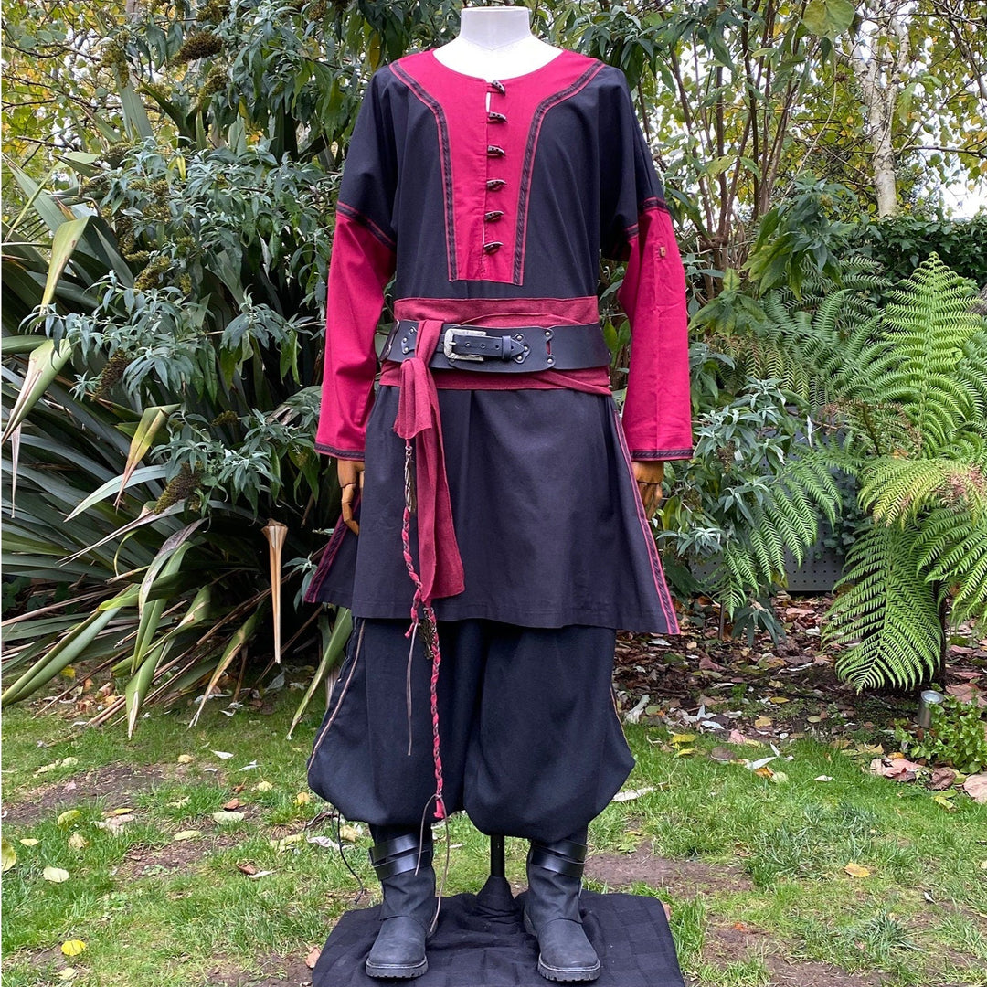 Medieval LARP costume with red accents and buttoned tunic.