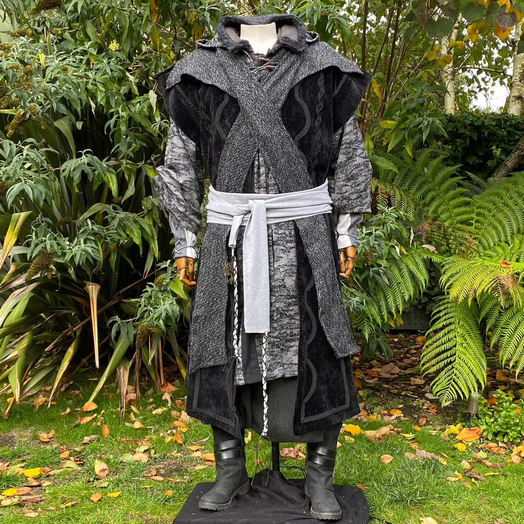 Medieval LARP outfit with grey hooded robe and sash.