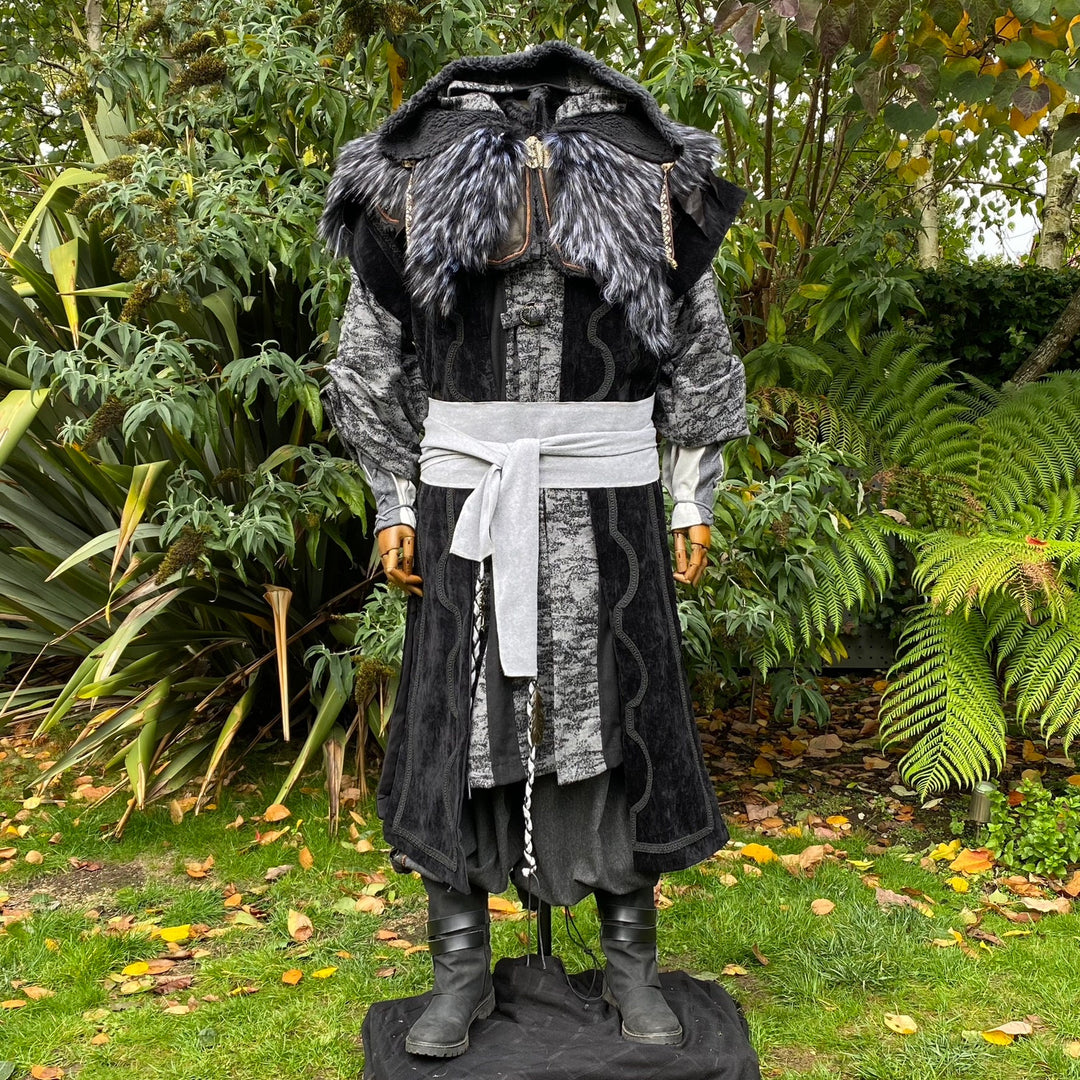 Medieval LARP outfit with ornate hood and sash.