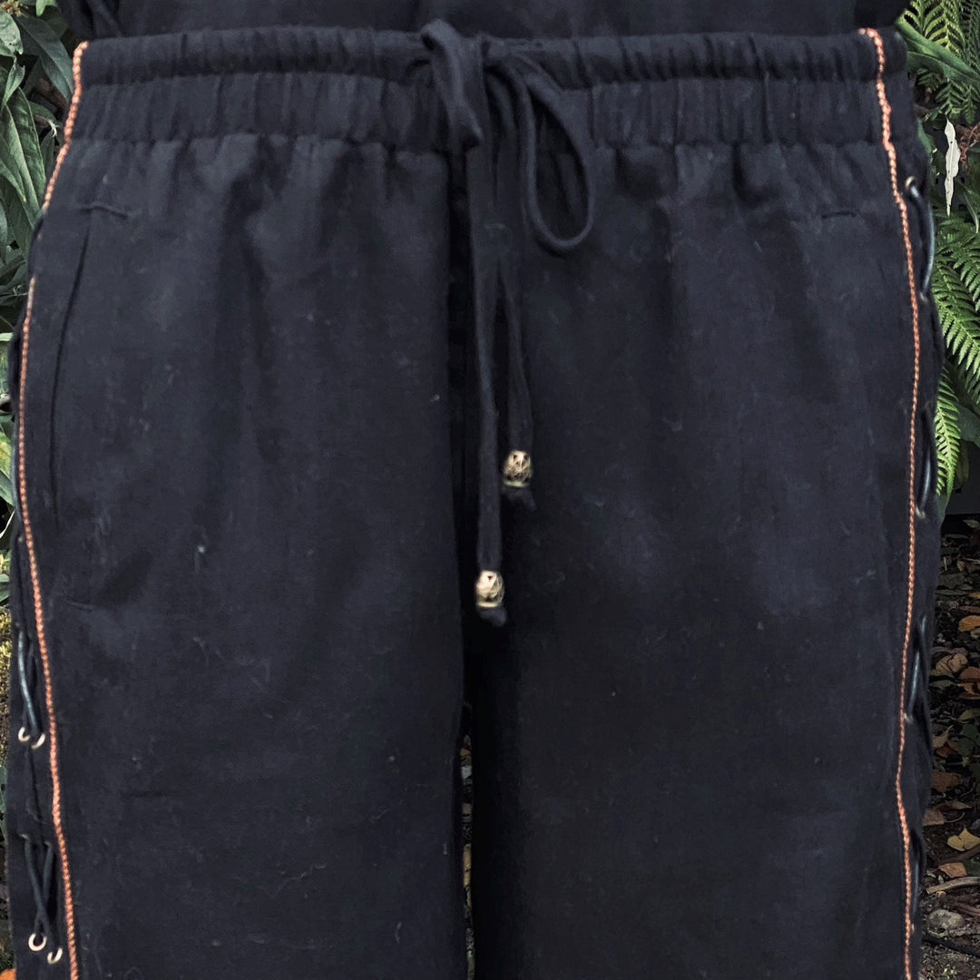 Black Viking trousers with tie waist and detailed side braiding for LARP.