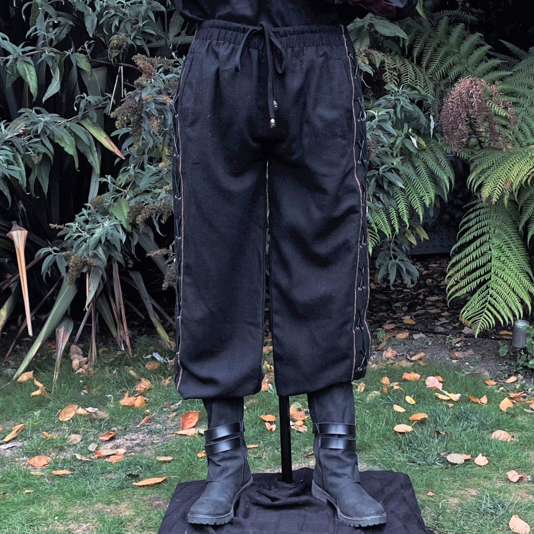 Black cotton LARP pants with side lace, front view.