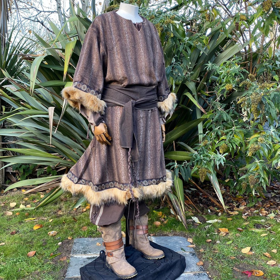 Brown mohair LARP tunic and sash with fur trim, front view with foliage background.