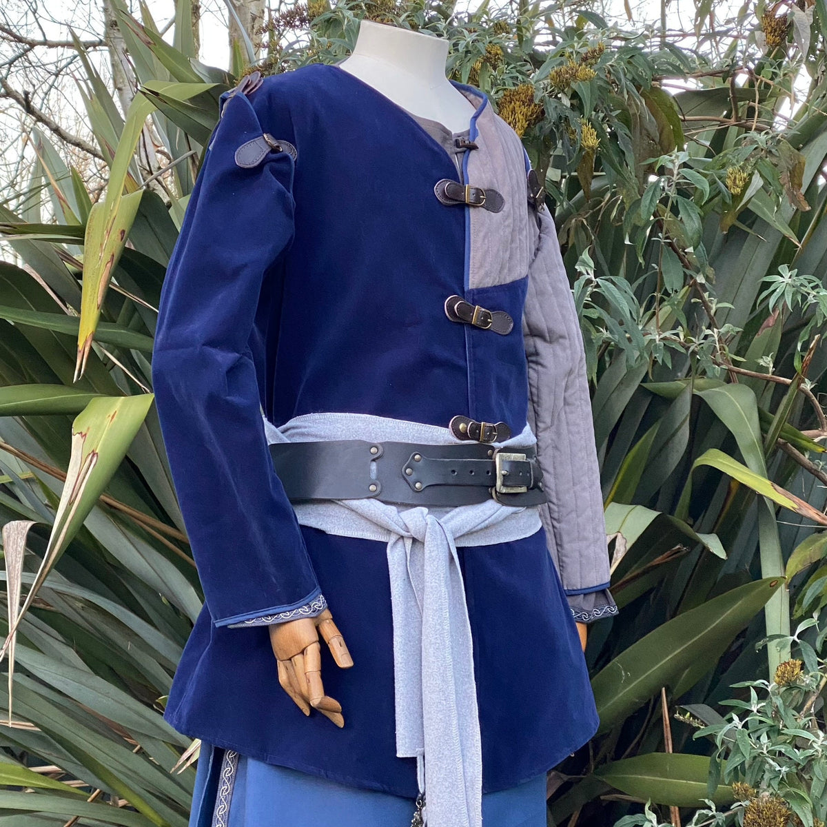 padded medieval jacket blue and grey with removable sleeves.