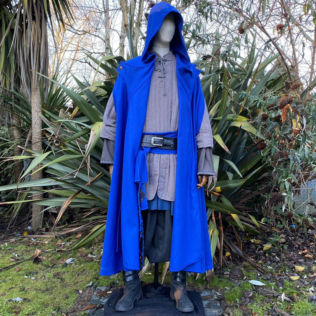 Mannequin in blue medieval cloak and grey gambeson.