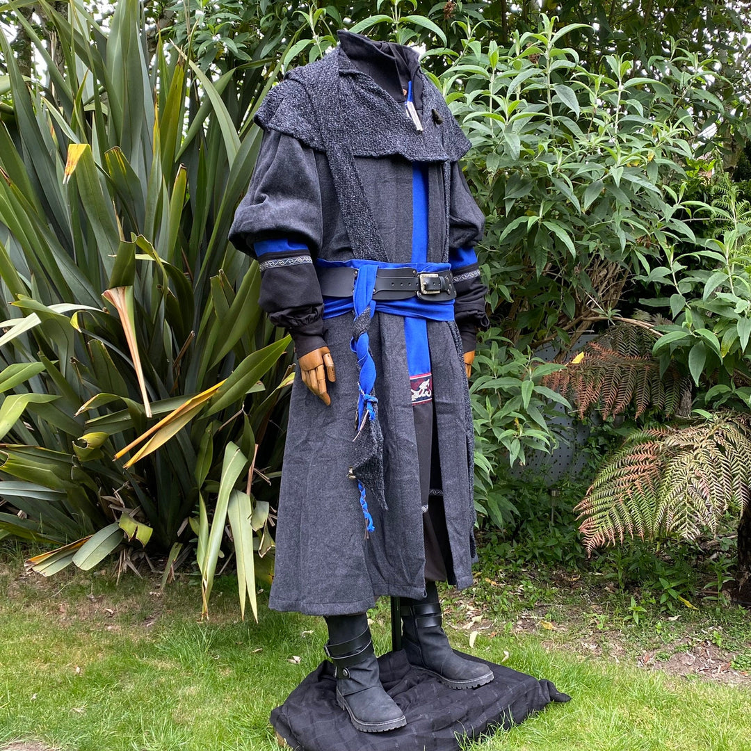 Mannequin in medieval LARP outfit with blue belt and black leather sash.