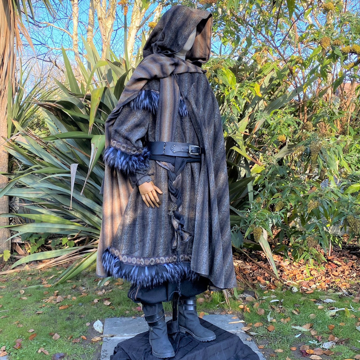 Side view of blue-grey striped cloak with hood, LARP medieval style.