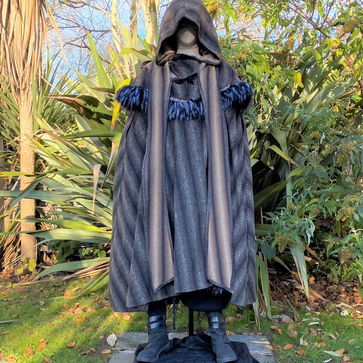 Dark blue hooded LARP cloak with feather trim, striped detail.