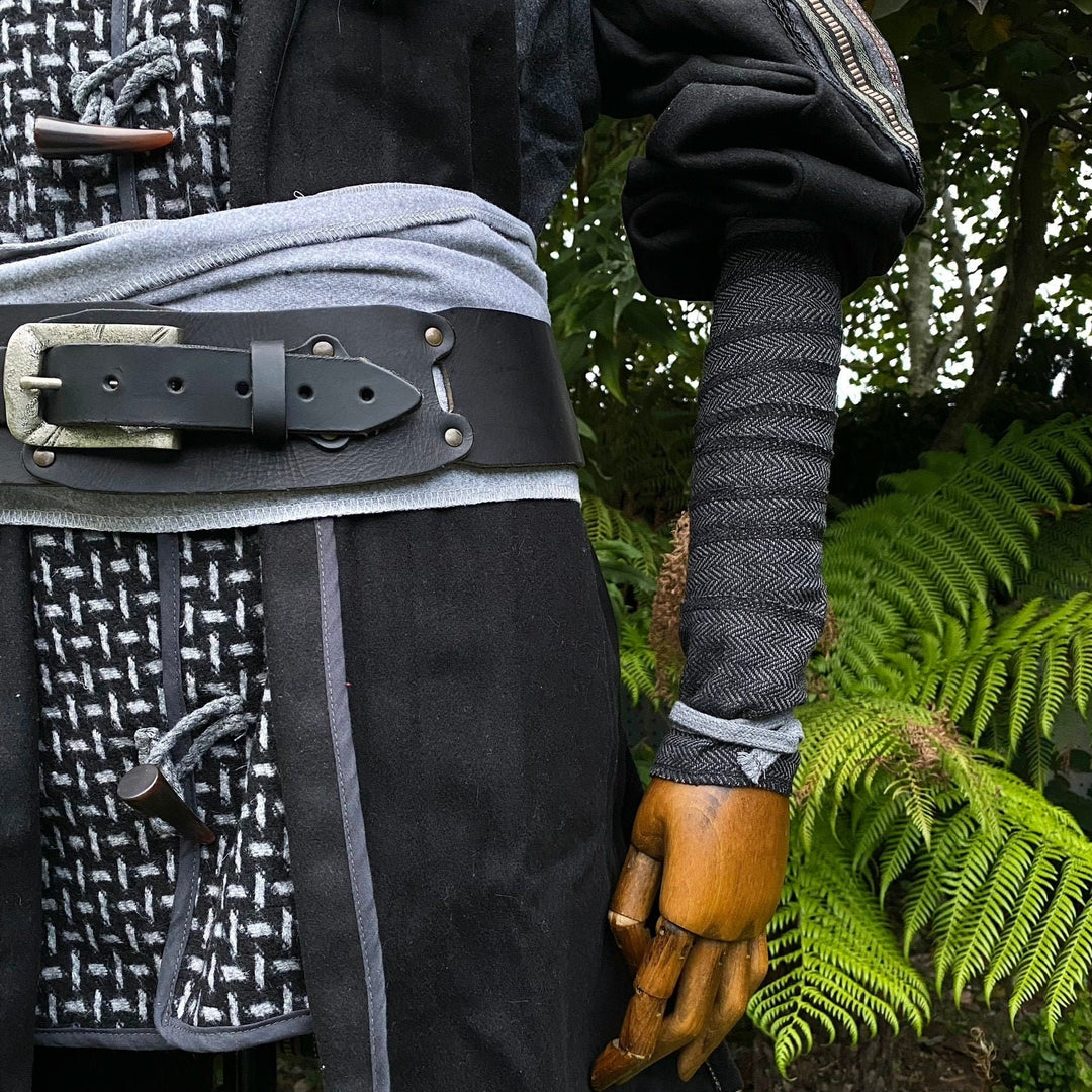 LARP medieval costume with herringbone wool arm wraps and leather belt.