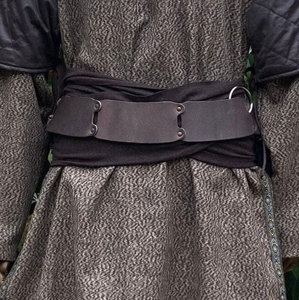 Brown LARP belt on grey medieval tunic with dark fabric wrap.
