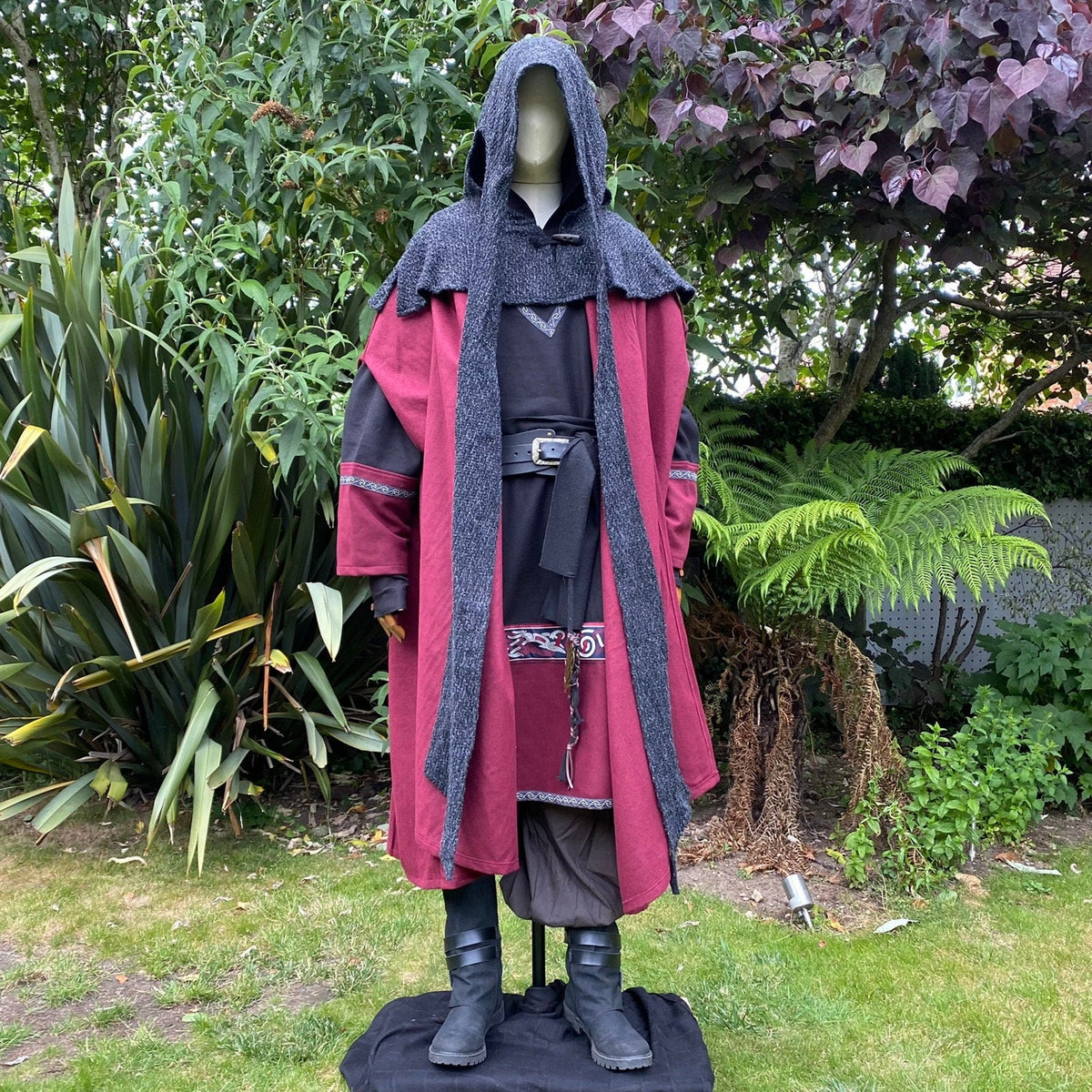 Mannequin in red cloak and hooded outfit for medieval LARP.