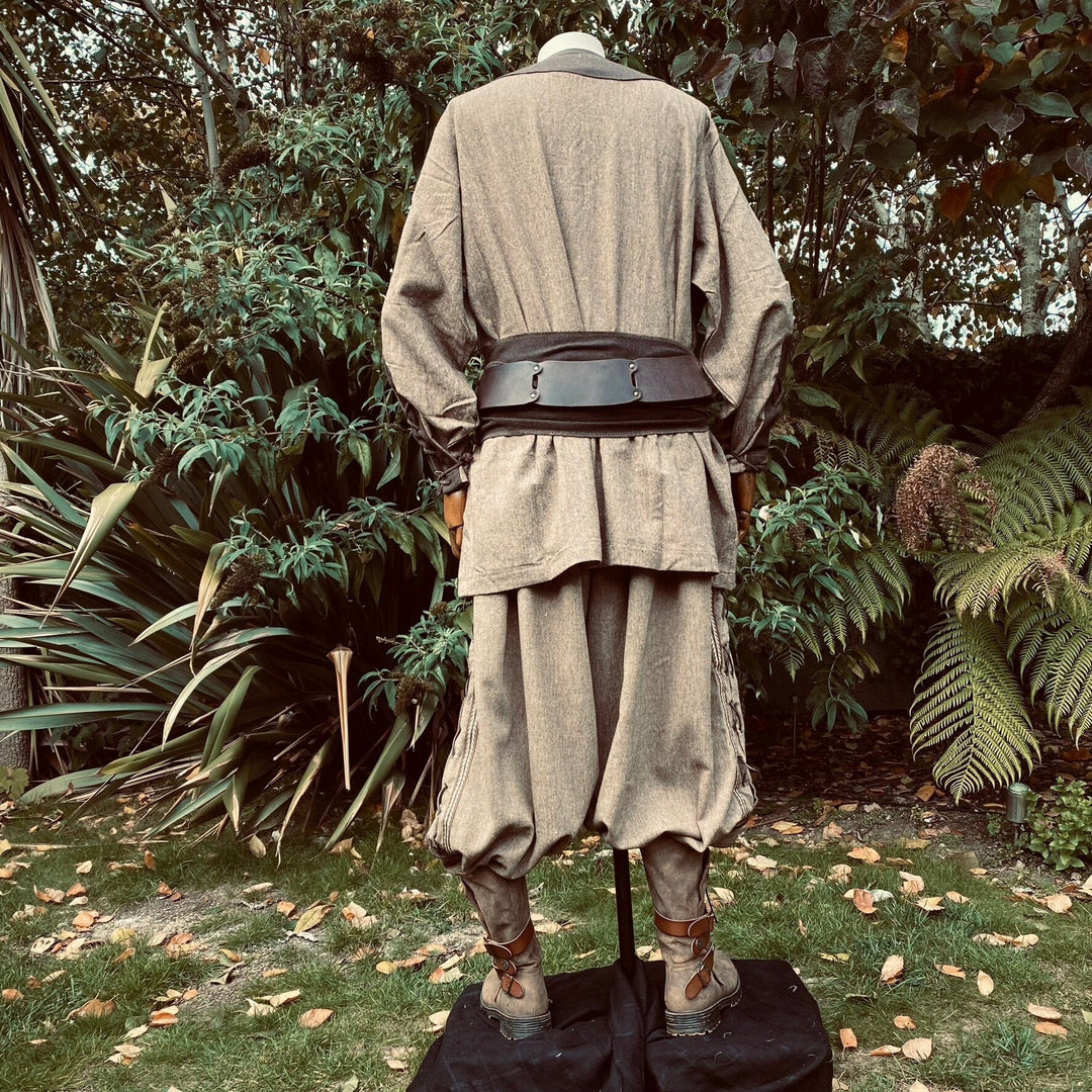 Back view of LARP outfit, brown tunic and pants with leather belt.
