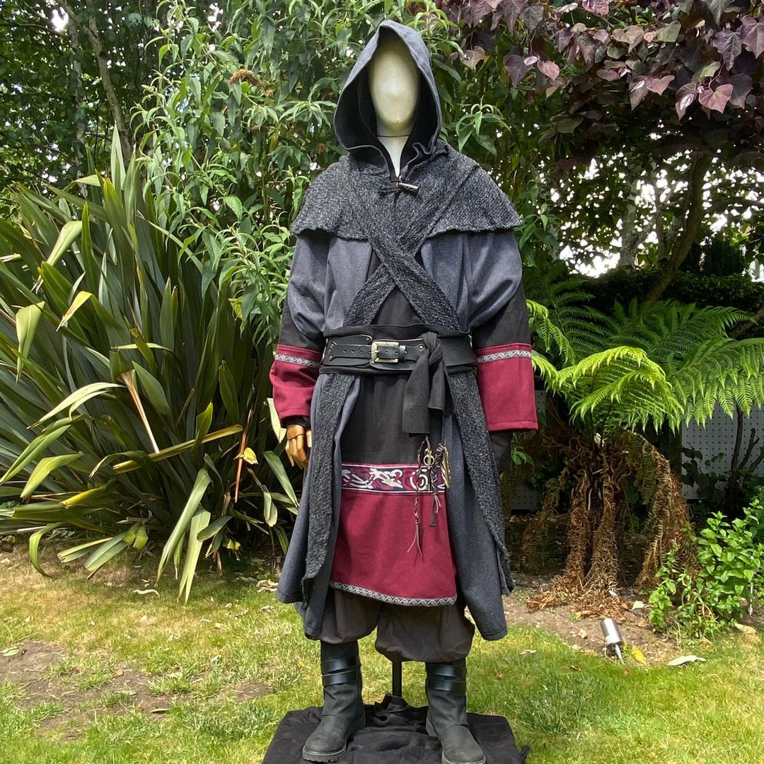 Medieval LARP mage outfit outdoors, dark cloak, hood up, intricate belt.
