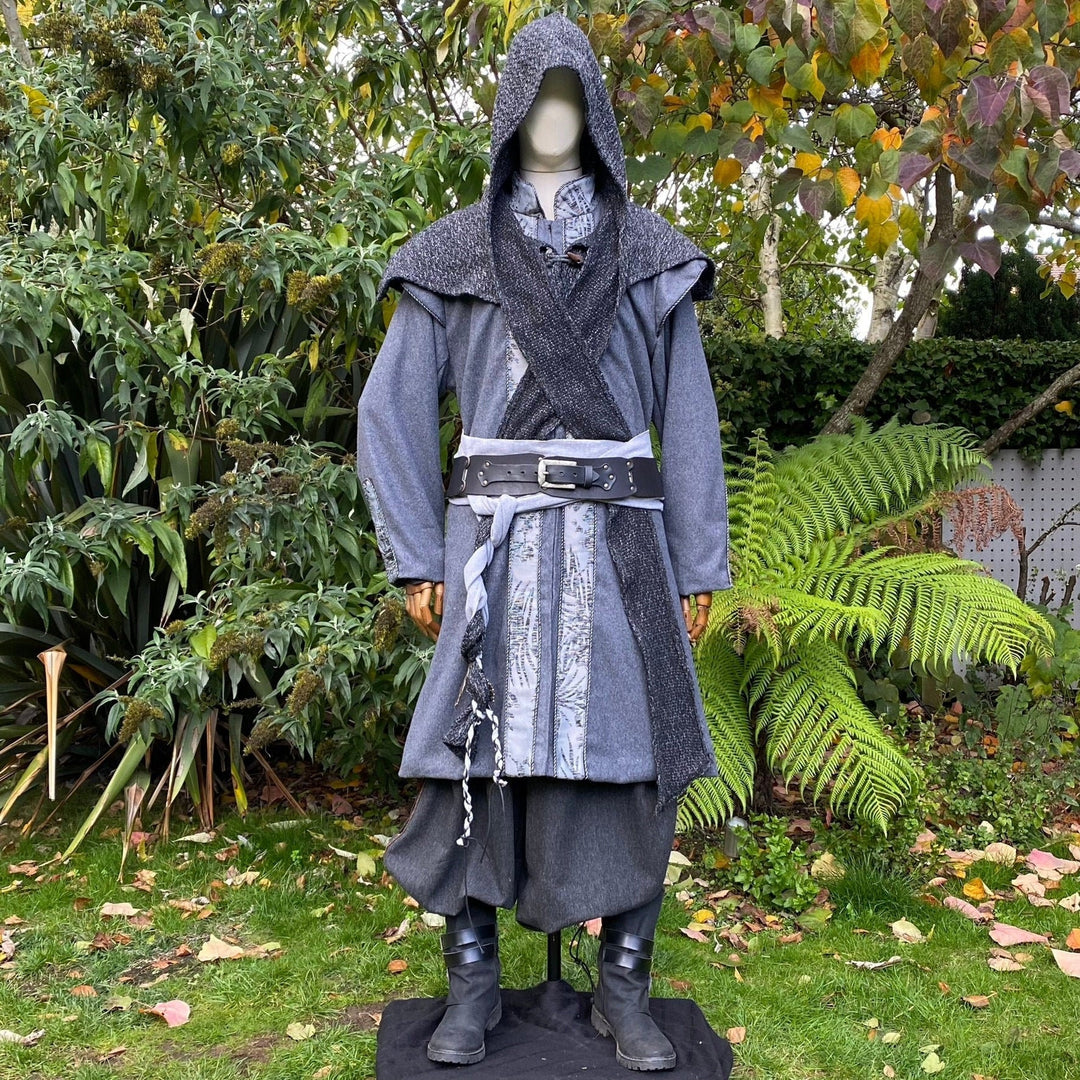 Grey elven LARP outfit with hood and sash set in lush garden scene.