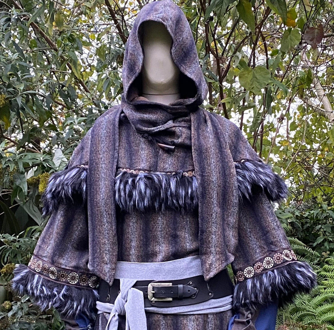 Medieval LARP mohair hood with fur trim in woodland setting, front view.