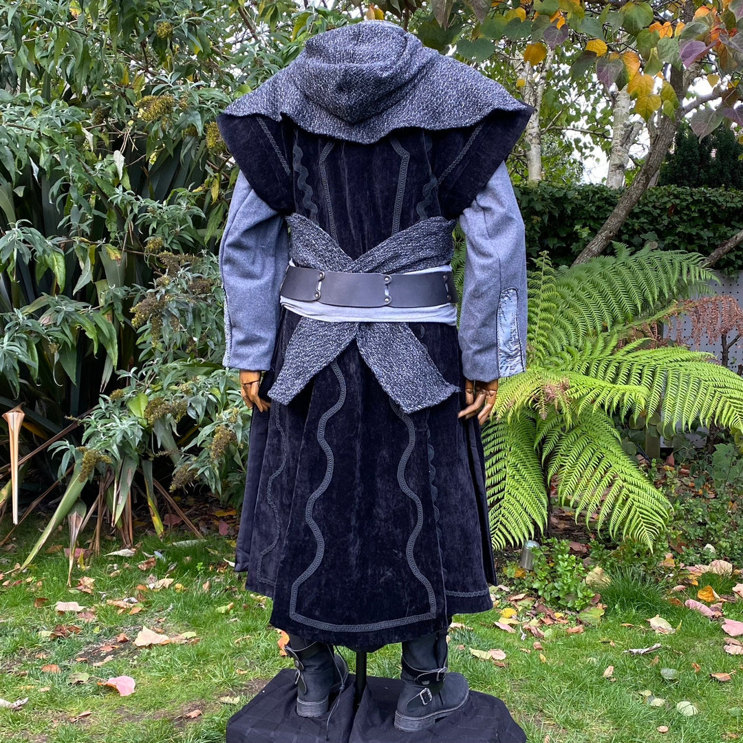 Rear view of medieval LARP coat with hood and leather belt.