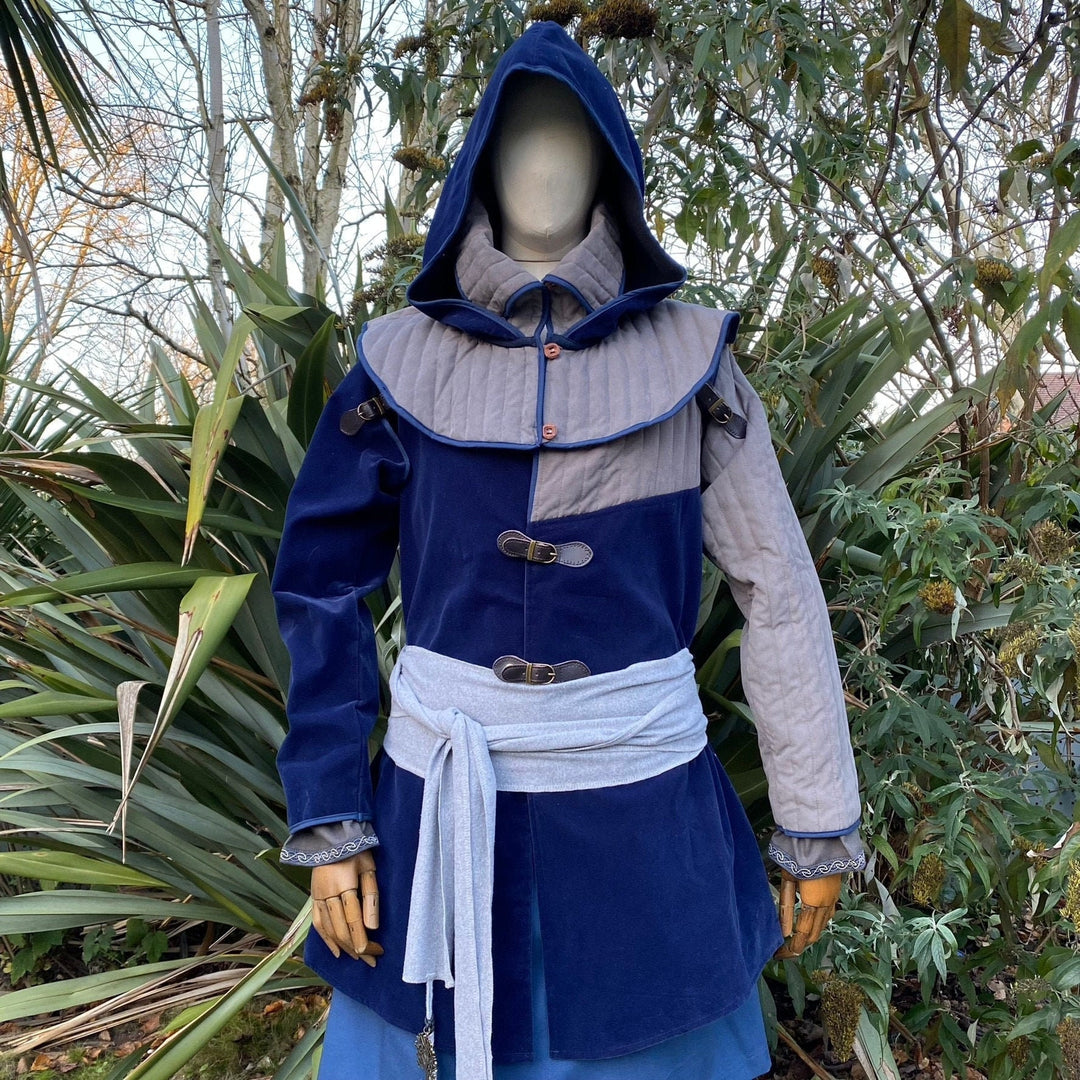 Mannequin in medieval LARP attire with blue hood and grey tunic.