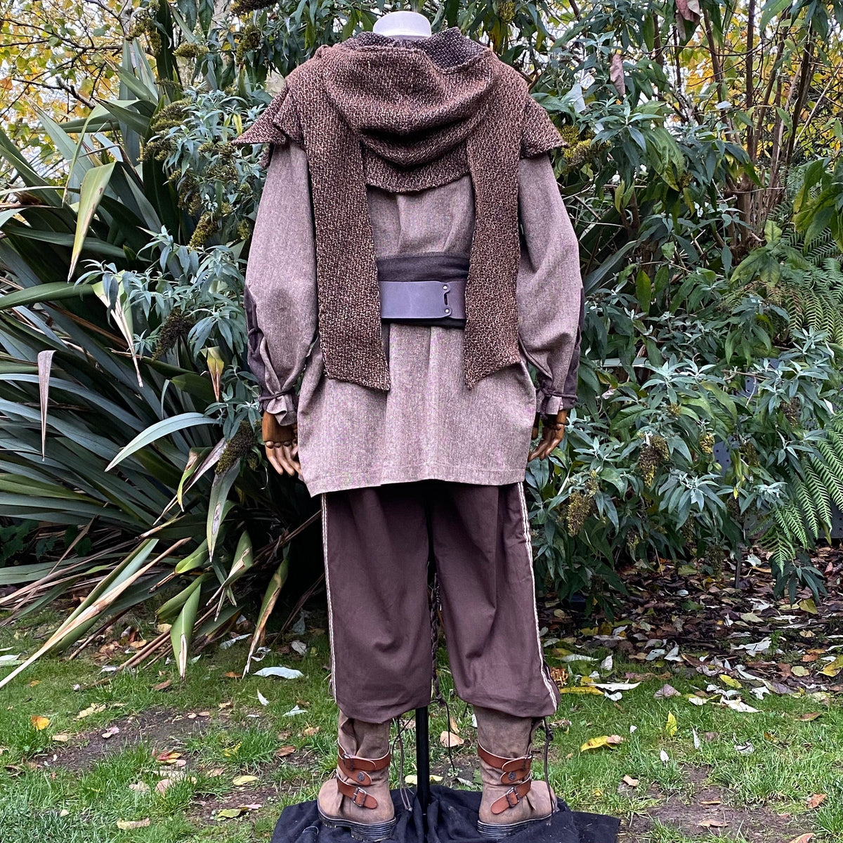 Rear view of medieval LARP outfit with brown hood and belt.