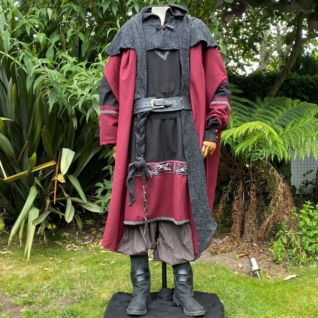 Medieval LARP outfit, front view with red cloak, braided belt.