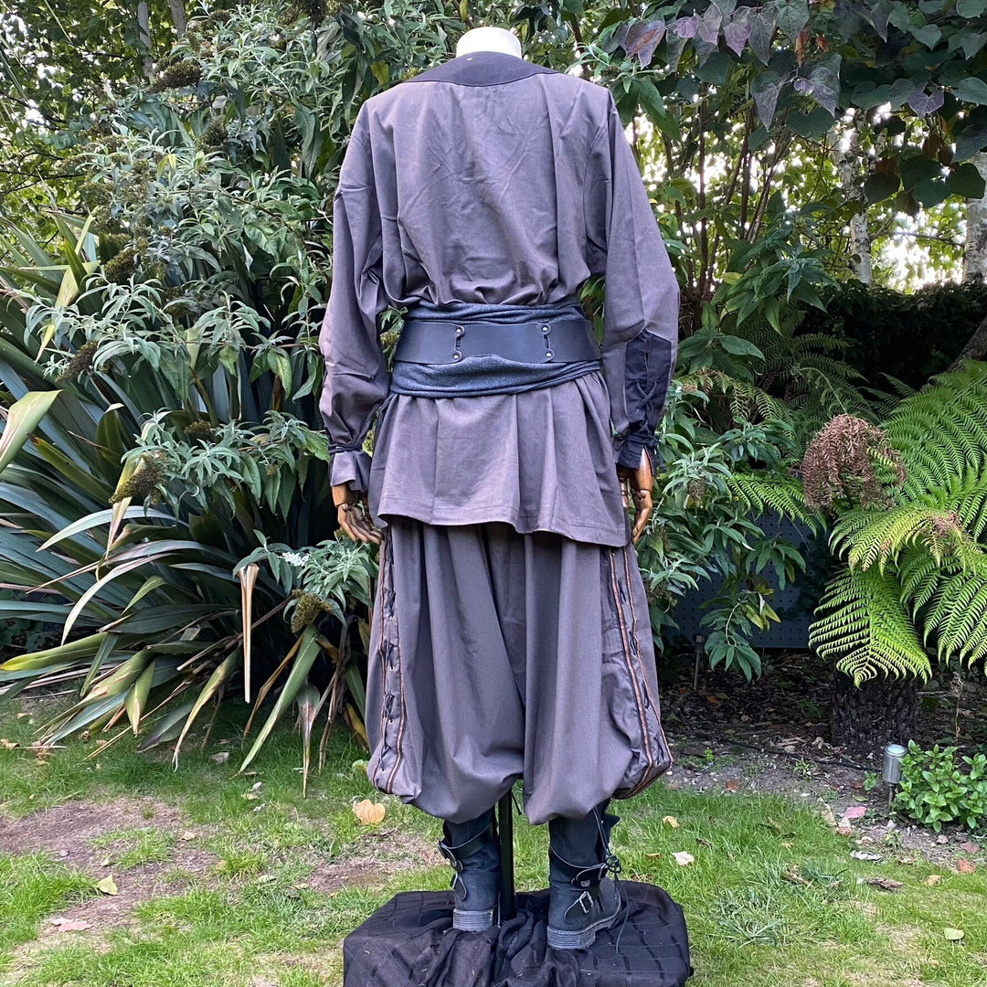 Back view LARP outfit with grey shirt, pants, and sash.