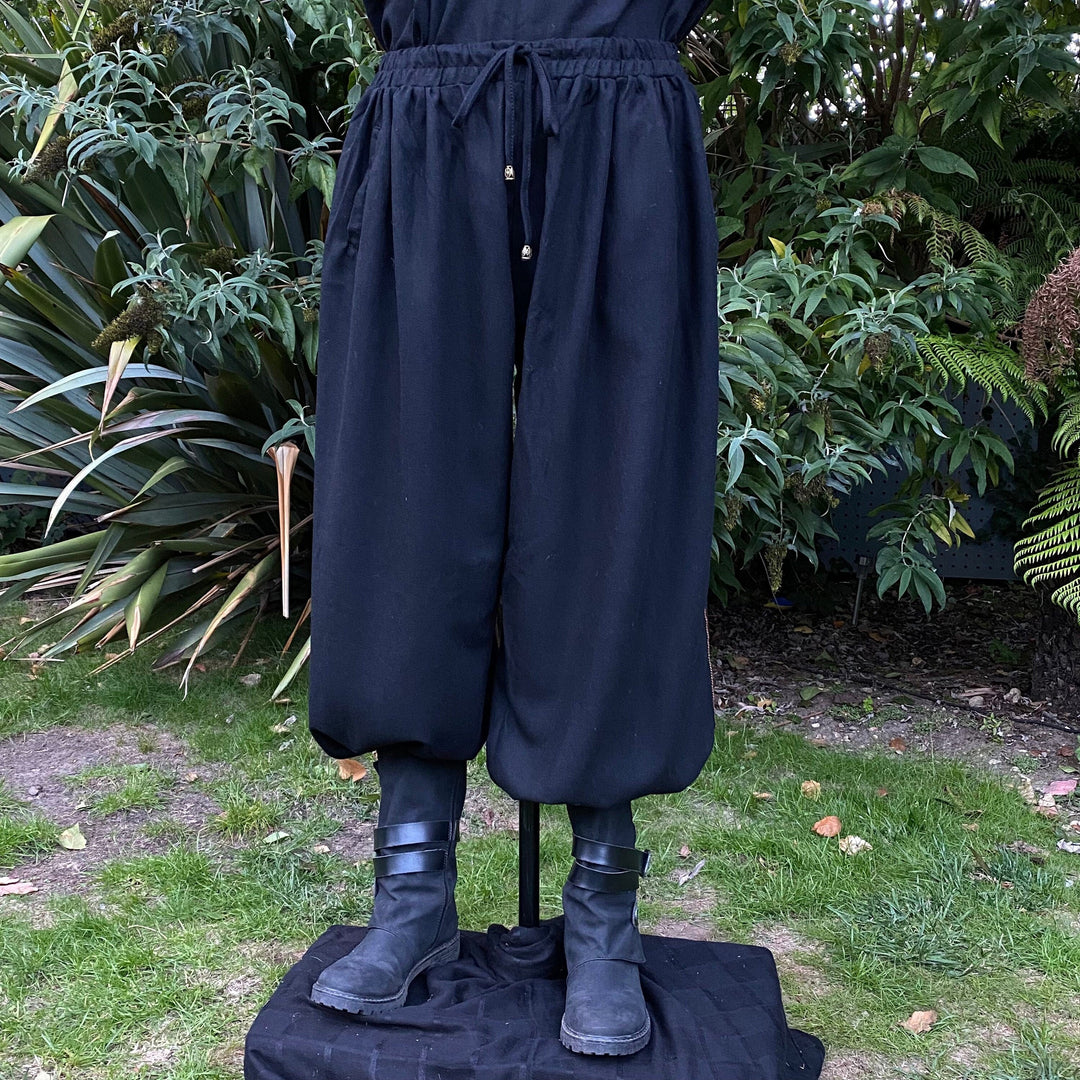 Loose Black Wool Medieval Laced Trousers.