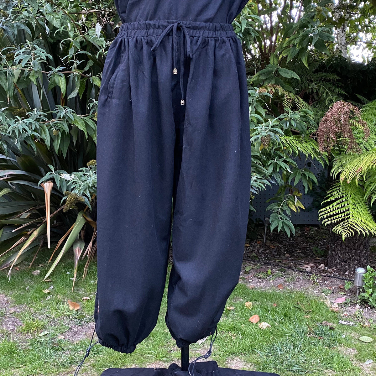 Black LARP wool pants front view with drawstring.