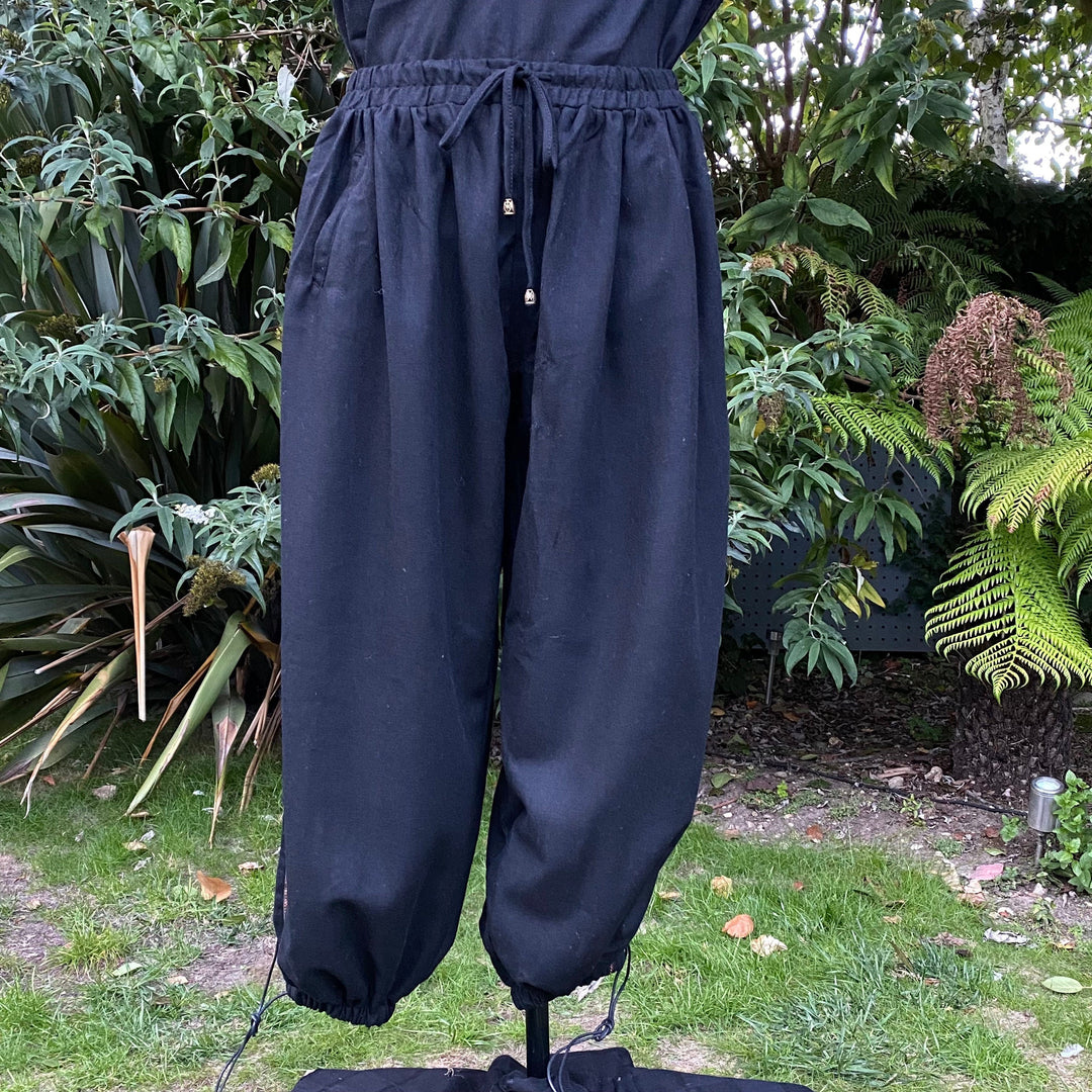 Black LARP wool pants front view with drawstring.