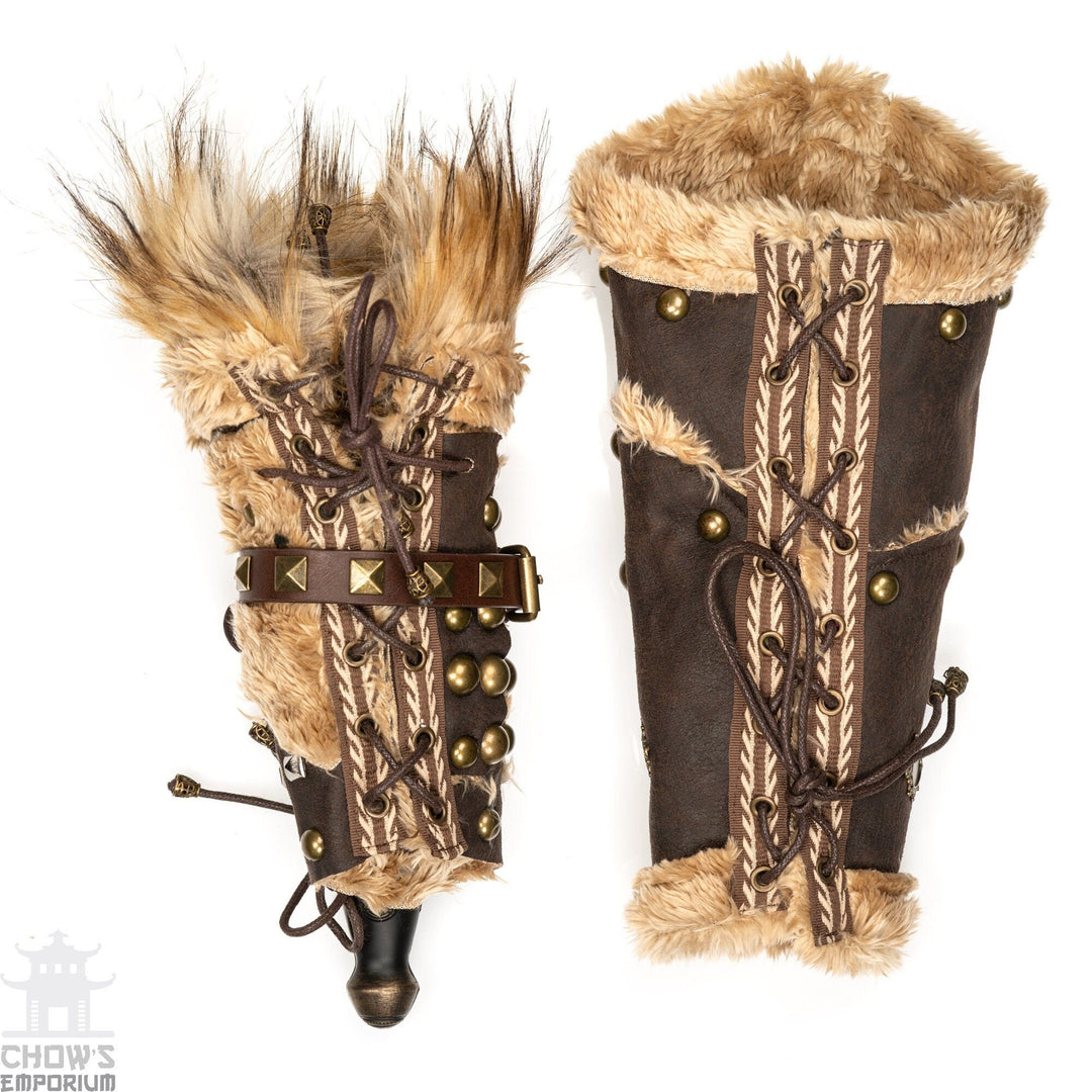 Brown faux leather vambraces with fur trim, laced for LARP.