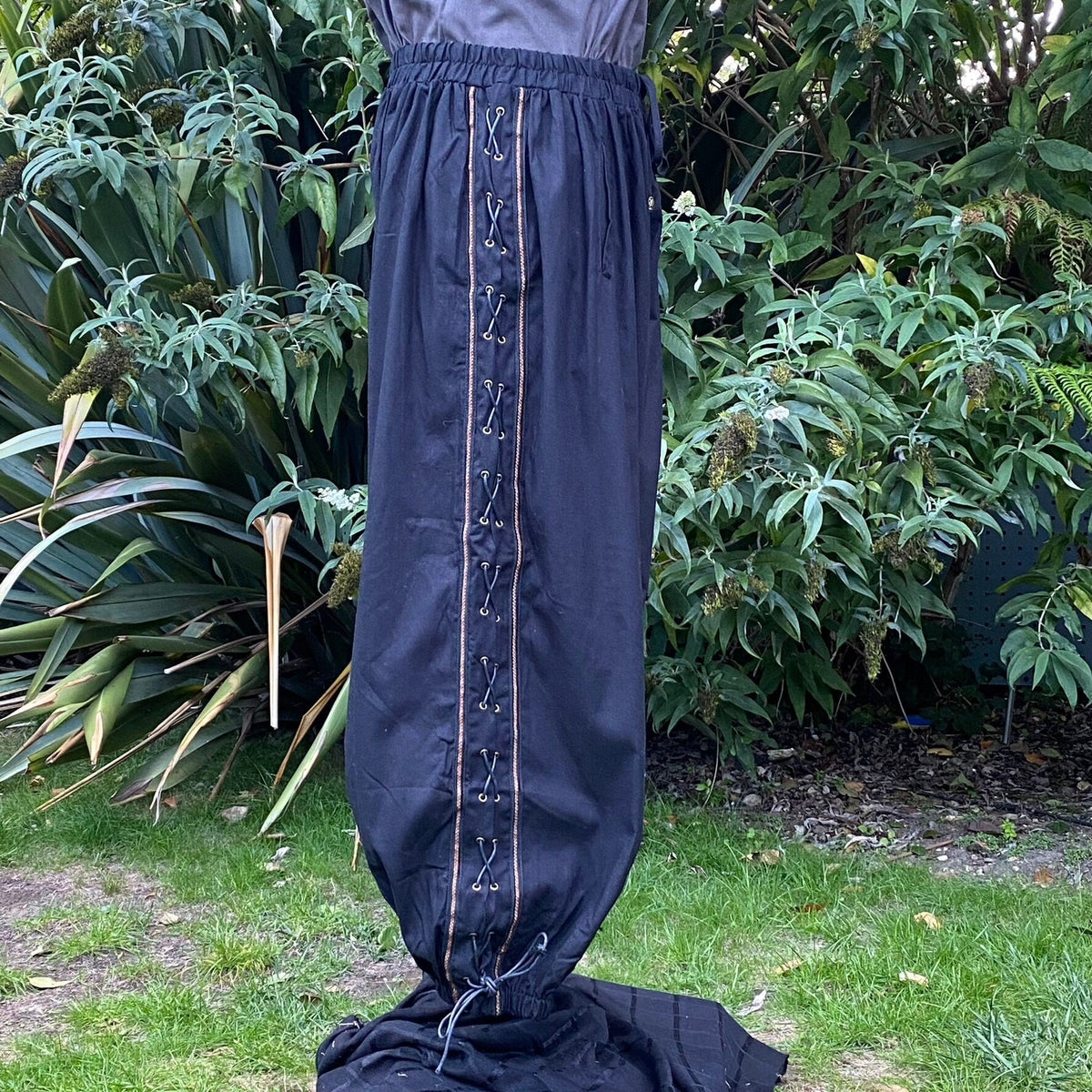 Black medieval trousers with side lacing, front view for LARP.