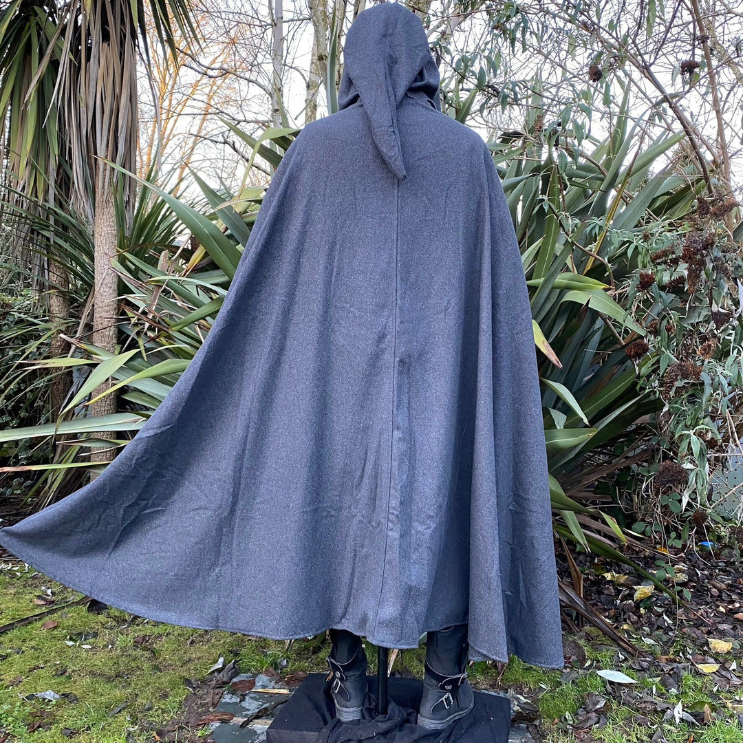 Medieval LARP outfit back view, featuring a grey hooded cloak, gambeson, tunic, and trousers.