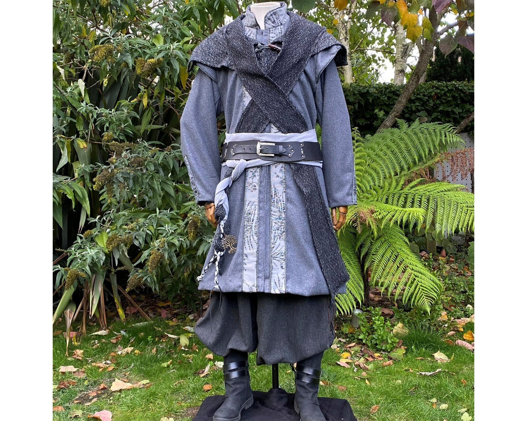 Grey Elven LARP ensemble in garden, detailed woollen coat with wrap hood.