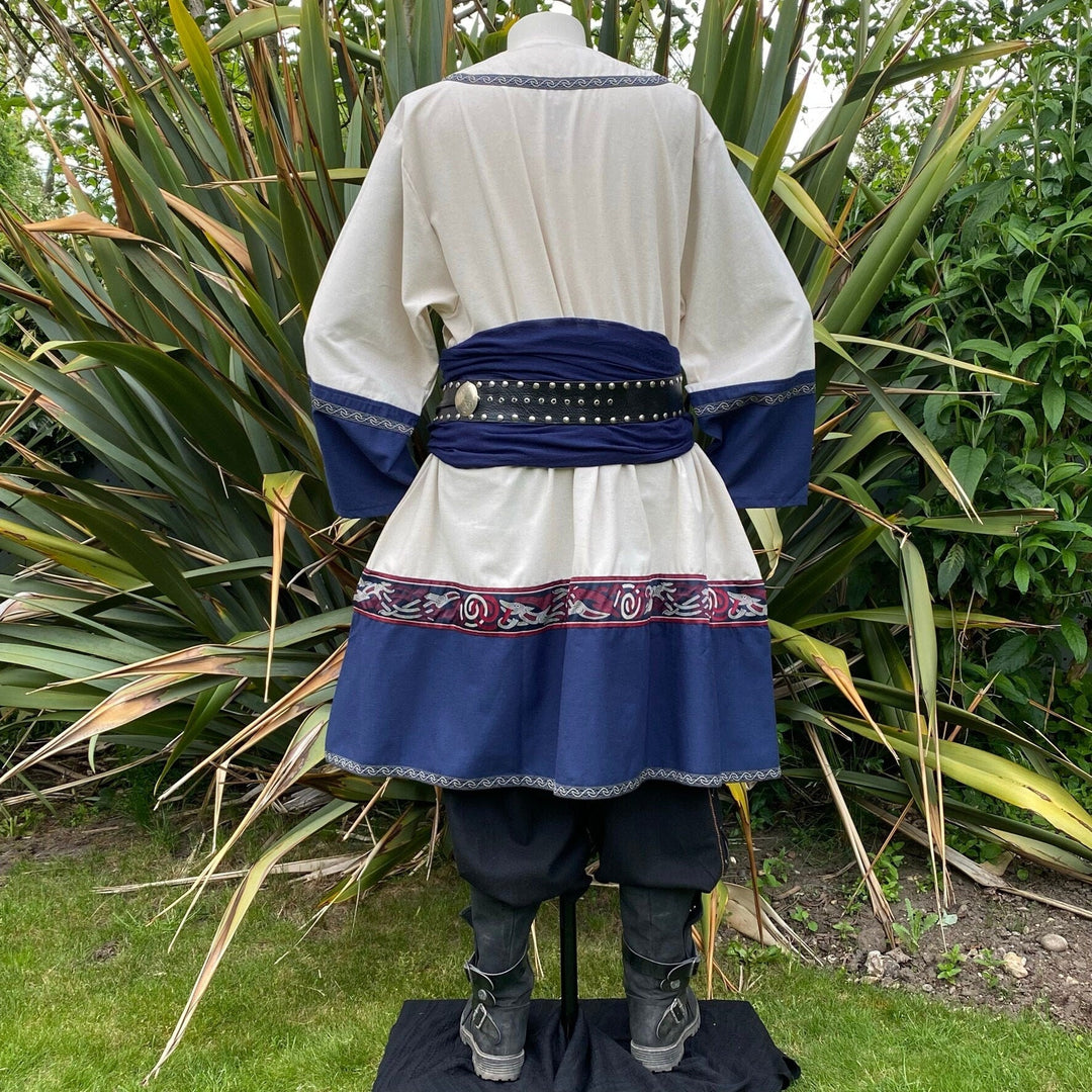 Back view of LARP Viking tunic in white and blue with intricate belt detailing.