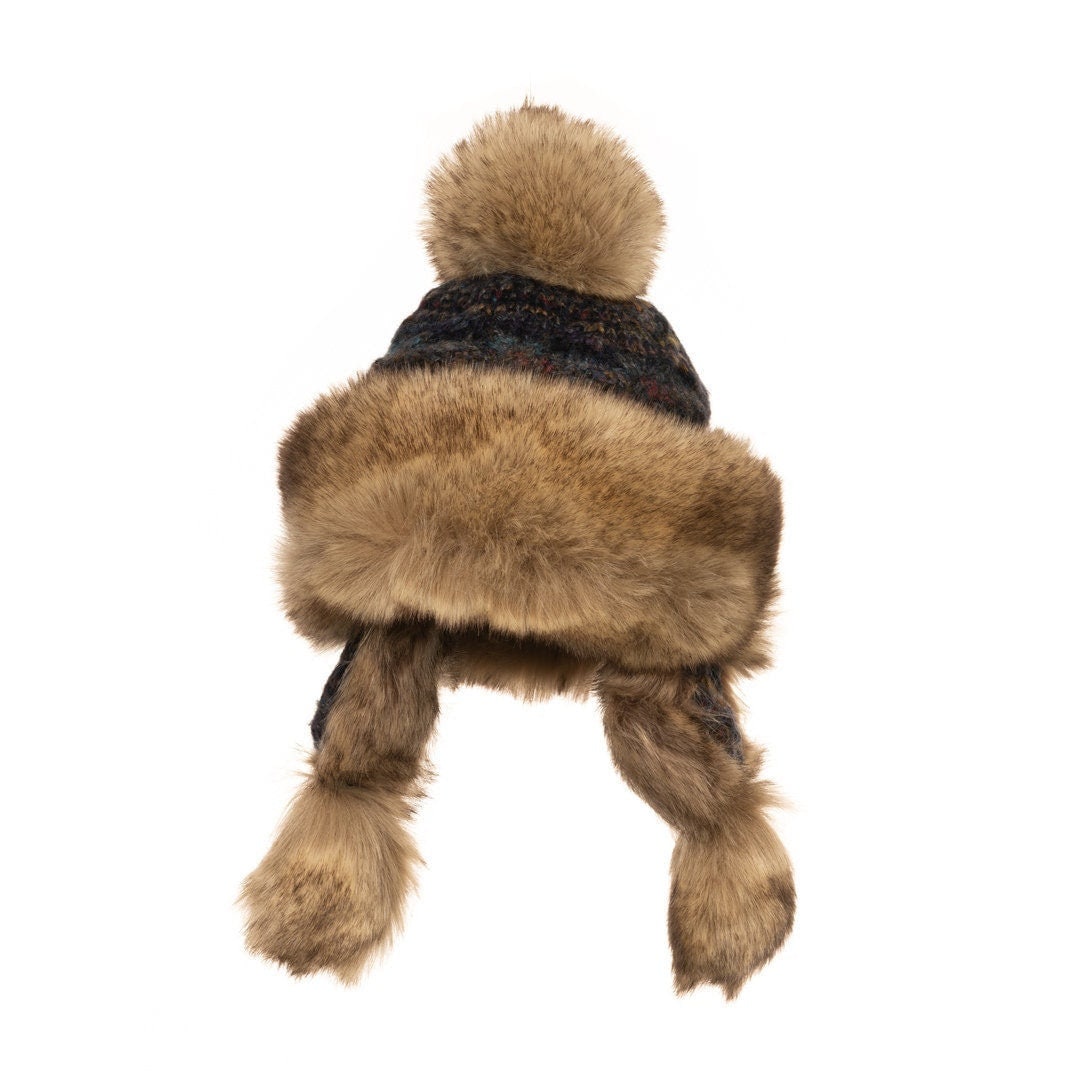 Rear view of blue medieval LARP hat with faux fur pom-pom and trim.