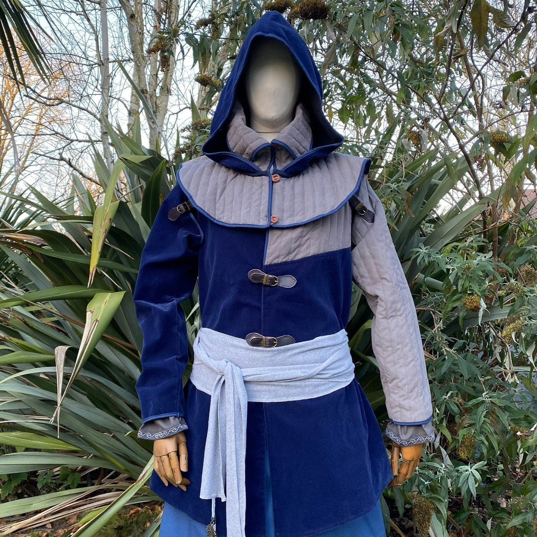 Medieval LARP attire with a blue hooded gambeson.