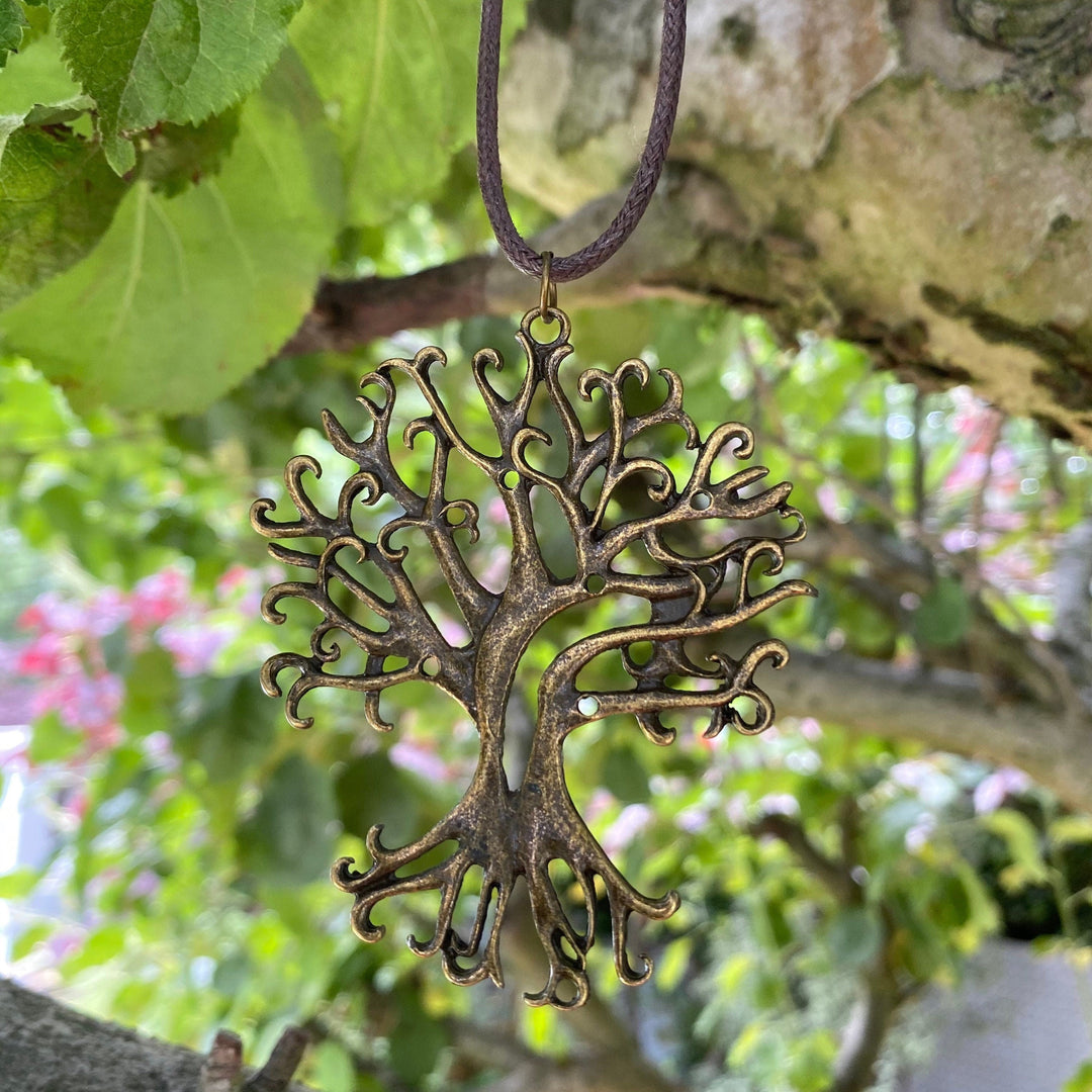 Antique brass tree pendant in nature for LARP.