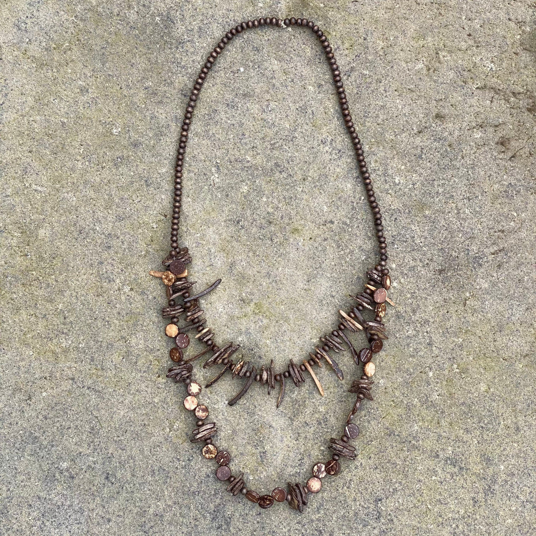 Double-layered tooth necklace on stone for LARP.