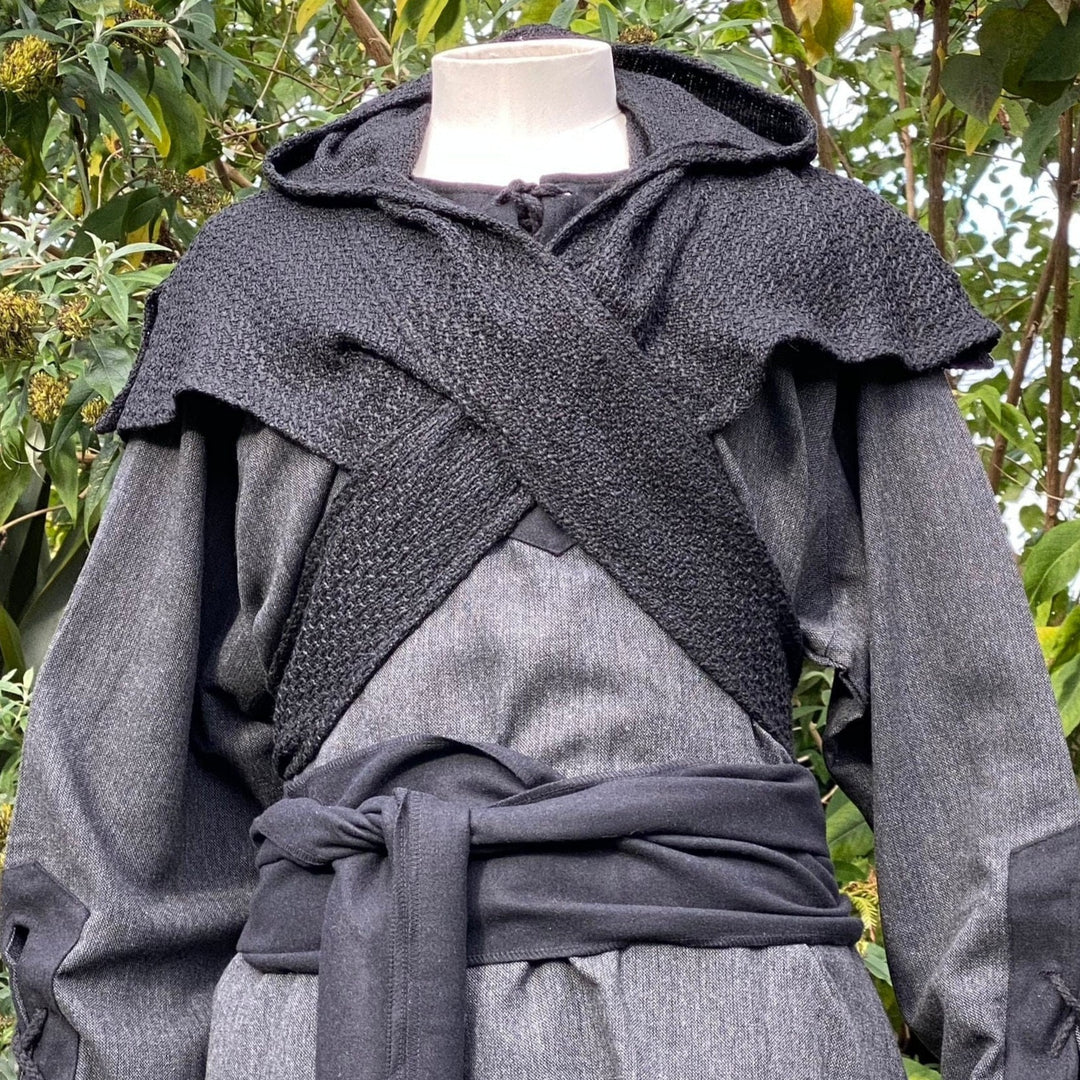 Close-up of black wool LARP hood with cross-pattern wrap design.