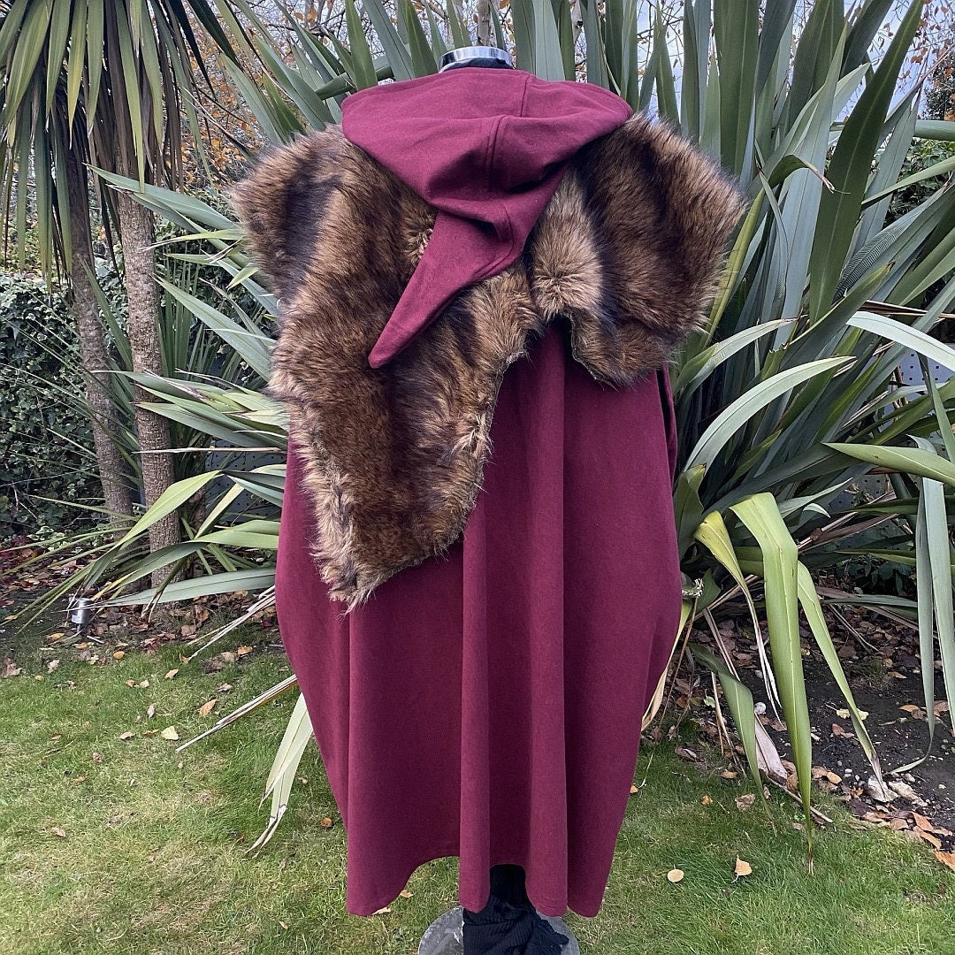 Back view of dark red LARP cloak with hood and faux fur mantle.