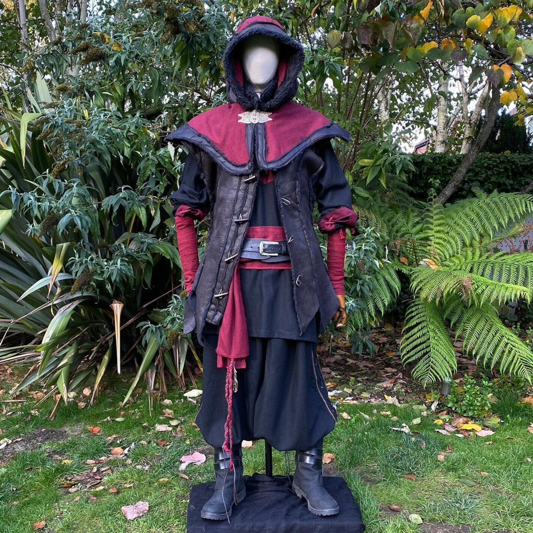 Medieval LARP outfit front view, featuring a red and black hood, waistcoat, shirt, and sash.