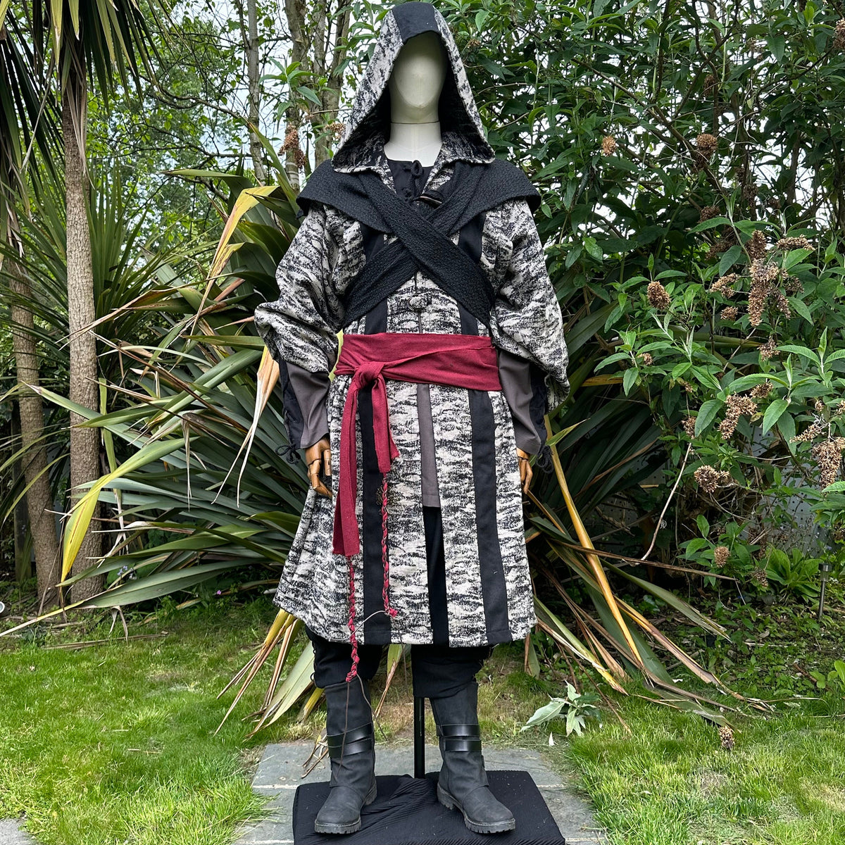 LARP battle mage set with grey robe, black hood, red sash.