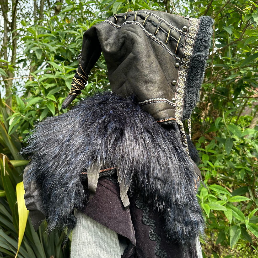 Black faux leather LARP hood, decorated side view, faux fur mantle.