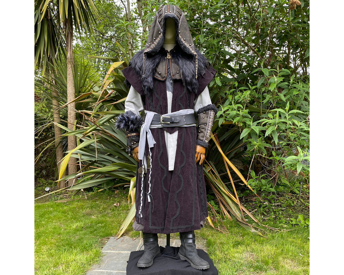LARP medieval outfit with hood, vambraces, and sash.