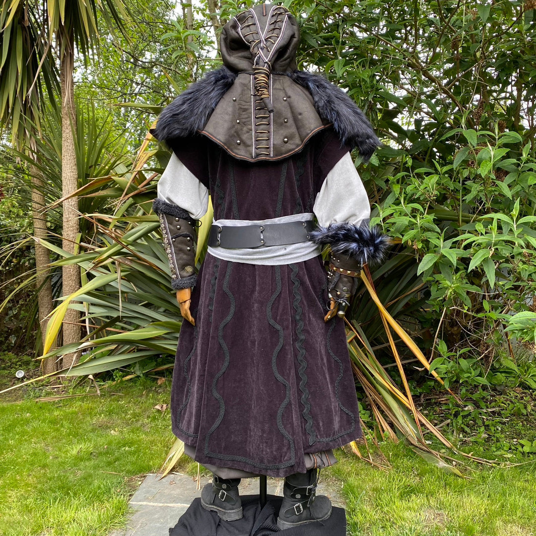 Back view of medieval LARP outfit with hood, fur trim, belt detailing.