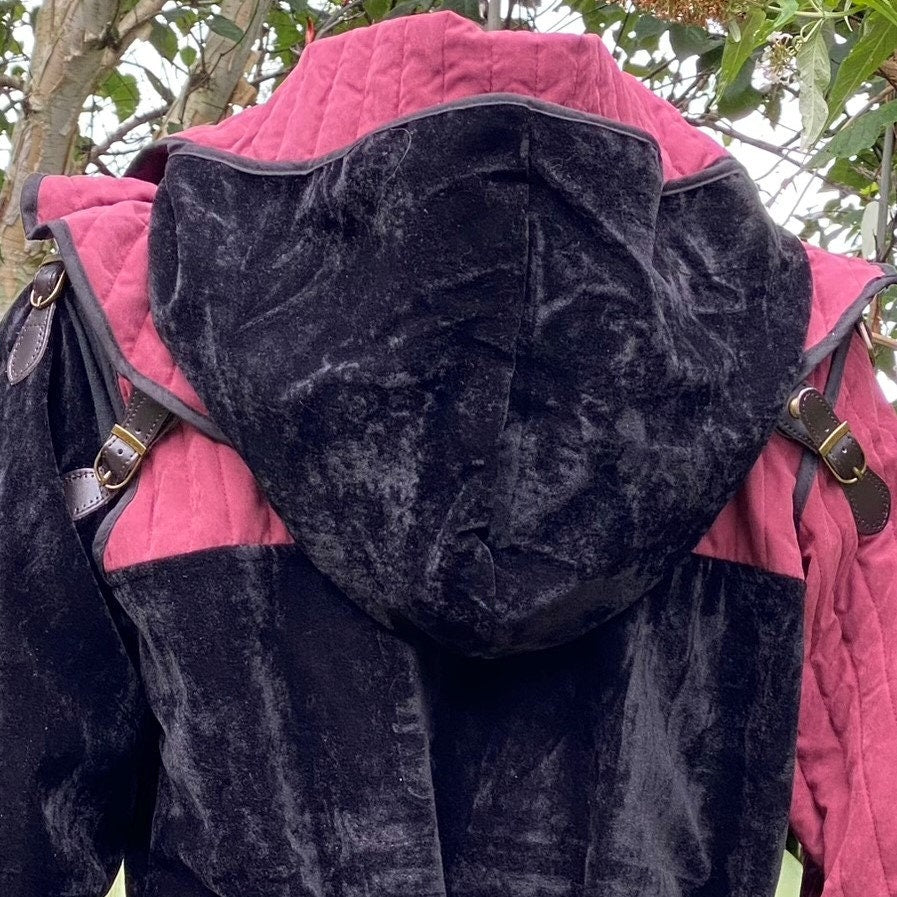 Black medieval LARP hood close-up, back view with buckle details.
